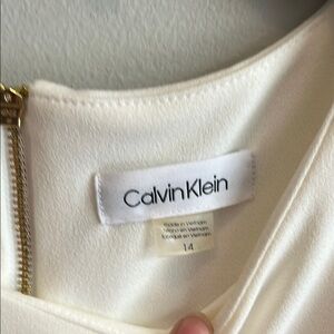 Calvin Klein Elegant Cream Peplum Dress